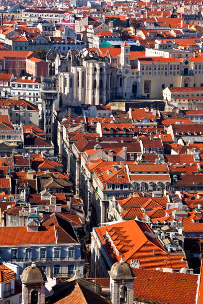 istock Carmo Convent ruins, Santa Justa lift or Elevator and orange rooftops 957382462