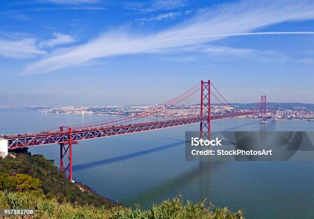 Ponte 25 De Abril Bridge In Lisbon Portugal Stock Photo - Download Image Now - Above, April, April 25th Bridge