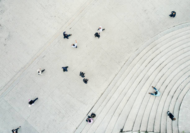 istock High Angle View Of People On Street 957388754