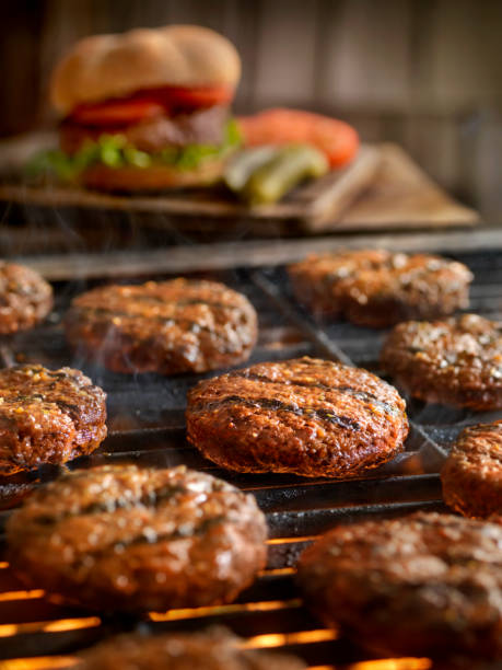 istock Hamburgers on the BBQ 957392892