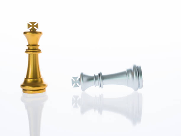 istock Golden king standing and silver lying 957393106
