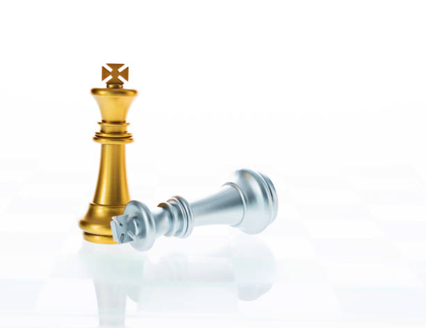 istock Golden king standing and silver lying down 957393192