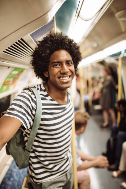 istock man on the london subway 957408348