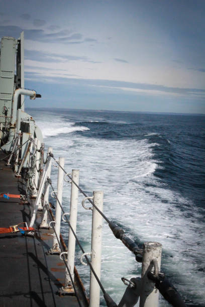 istock Overlooking the sea off of a Naval ship 957421056