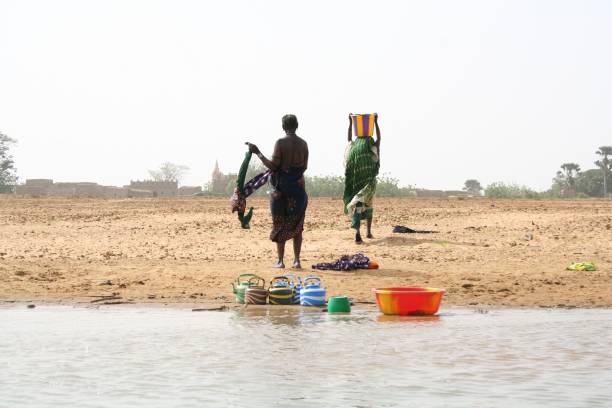 istock Women along the Niger river 95742167