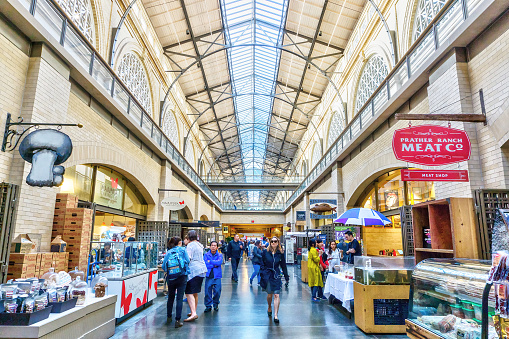 Shoppers visit the public marketplace, known as the Nave, at the historic Ferry Building in downtown San Francisco. Opened in 1898, the landmark building is a terminal for San Francisco Bay ferries and a farmers market.