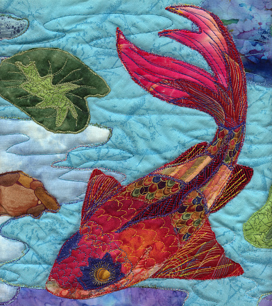 My own artwork. One of several textile fish I did some time ago. Each tiny piece of fabric is cut out, stitched down to a base and then layered and quilted. Quilt art, such as this is generally not much thinner than traditional quilting.