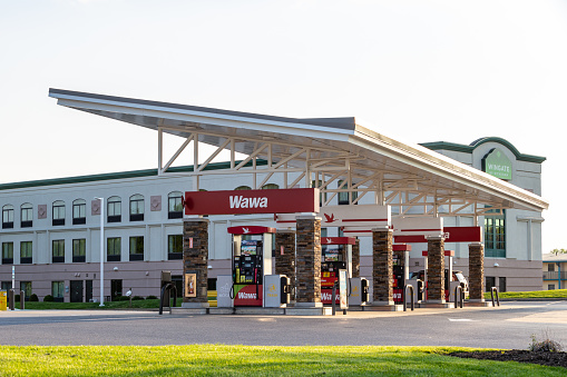 Lancaster, PA, USA - May 8, 2018: Fuel pumps at WaWa, a chain of fast food, gas, and convenience stores, which has over 750 locations.
