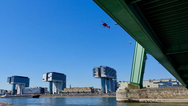 istock Helicopter flying over Cologne Rheinauhafen 957458738