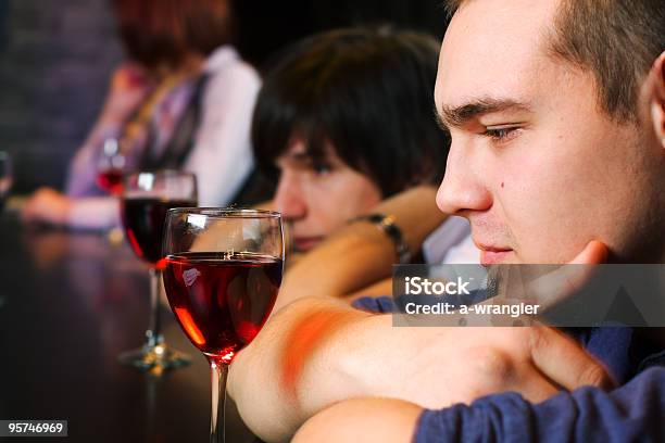 Young Men Relaxing In A Night Bar Stock Photo - Download Image Now - Adult, Adults Only, Alcohol - Drink