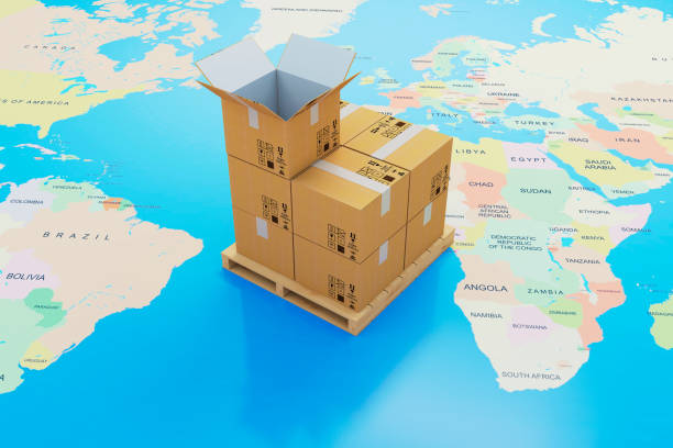 istock 3d cardboard boxes and world map, global delivery shipping concept 957474316