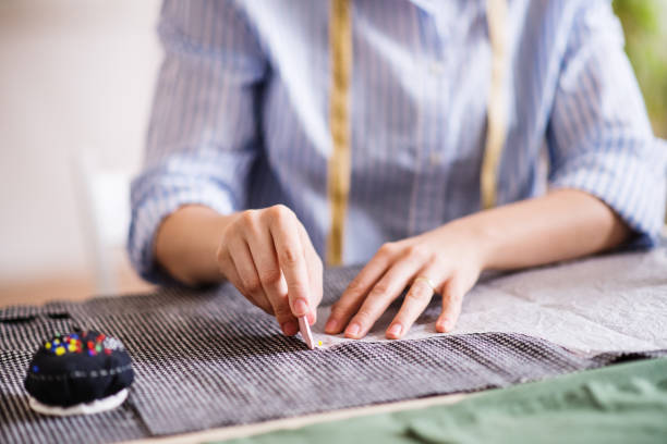 istock Unrecognizable creative woman in a studio, startup business. 957476854