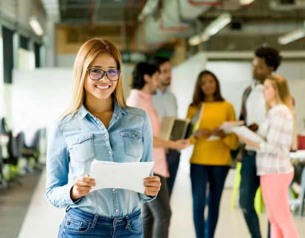 istock Happy woman working at a creative office 957477062