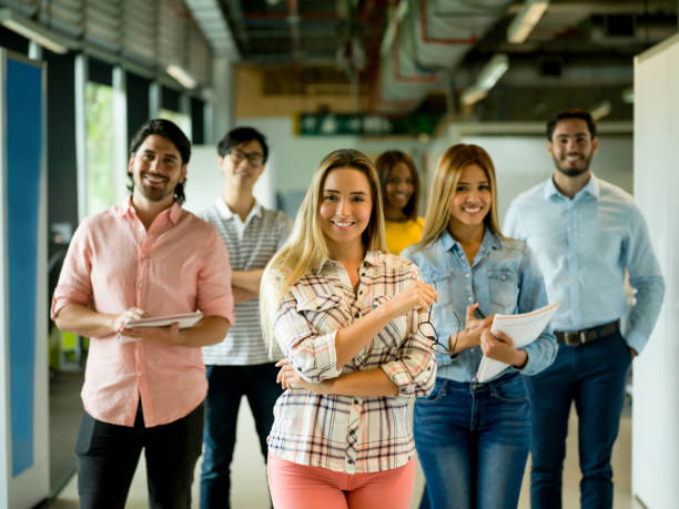 istock Woman leading a team at a creative office 957477196
