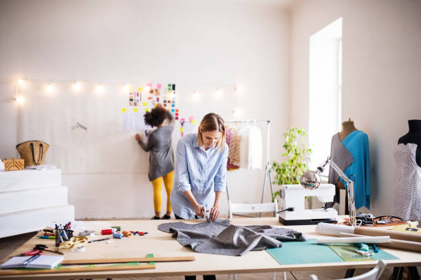 istock Young creative women in a studio, startup business. 957477488