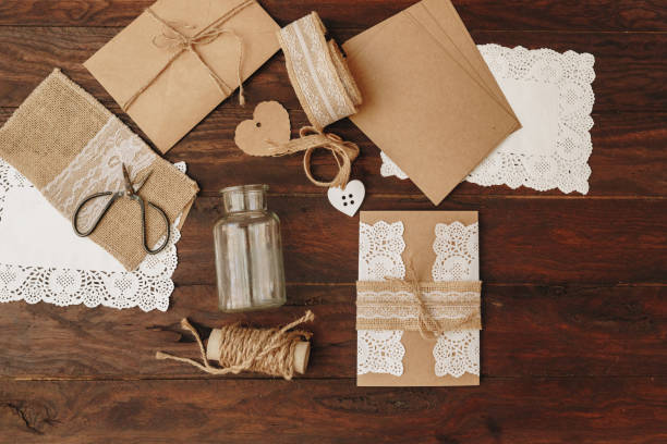istock Diy creative  idea. Handmade card invitation. Wedding card invitation on wooden table 957477506