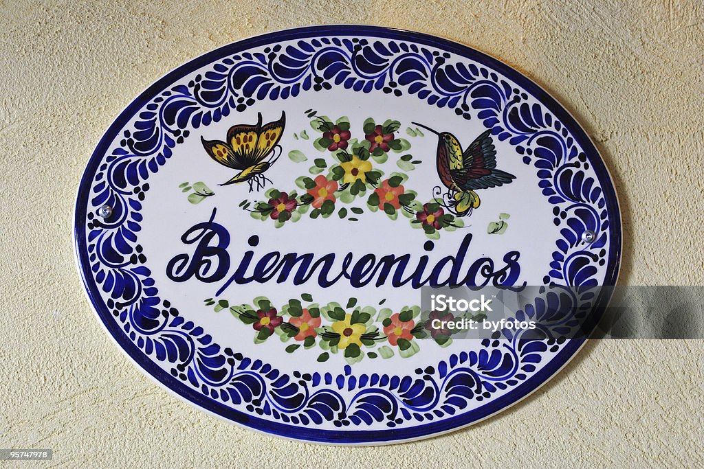 Welcome sign in Spanish Bienvenidos  Building Entrance Stock Photo