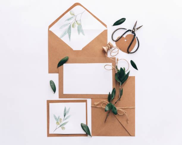 istock Flat lay Workspace Mock Up Wedding invitation cards, craft envelopes.  top view. Templates. 957482864