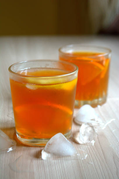 istock Iced tea with lemon and orange. Refreshment 957483136