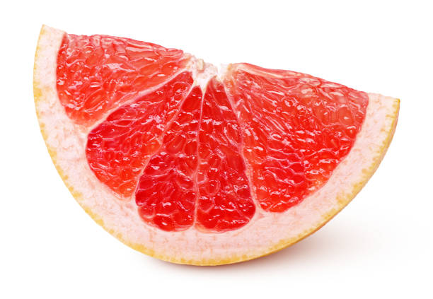 白で隔離ピンク グレープ フルーツの柑橘系の果物のくさび - citrus fruit portion grapefruit fruit ストックフォトと画像