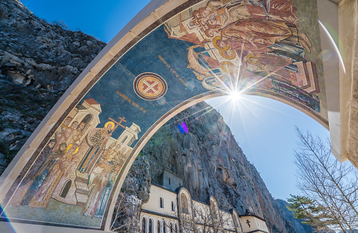 Arched gates with beautiful mosaics at the entrance to the Ostrog Monastery, Montenegro