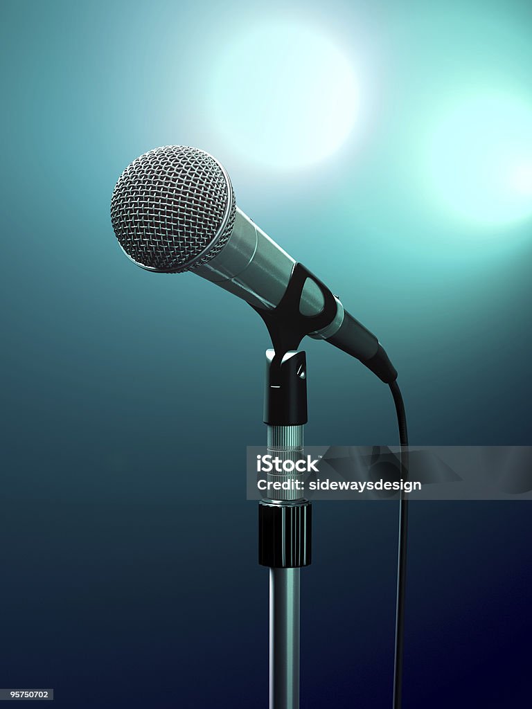 Up close photo of a microphone mounted on a stand Microphone on stage with turquoise stage lights. Microphone Stock Photo