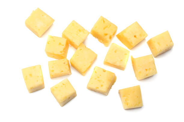 istock piece of cheese isolated on white background. top view 957510878