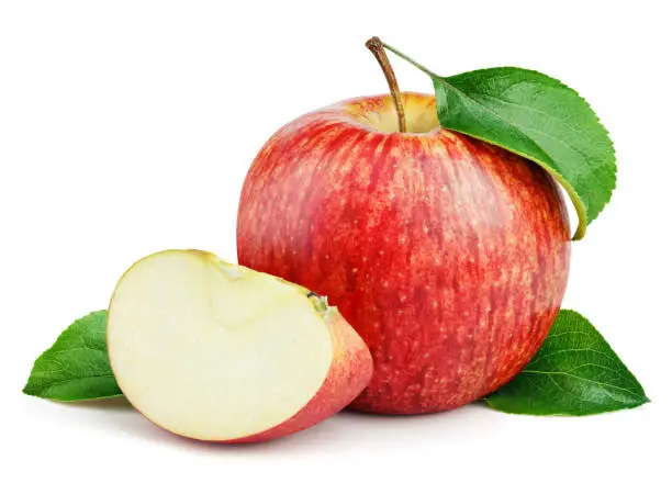 Ripe red apple fruit with apple slice and green leaves isolated on white background. Red apples and leaves with clipping path