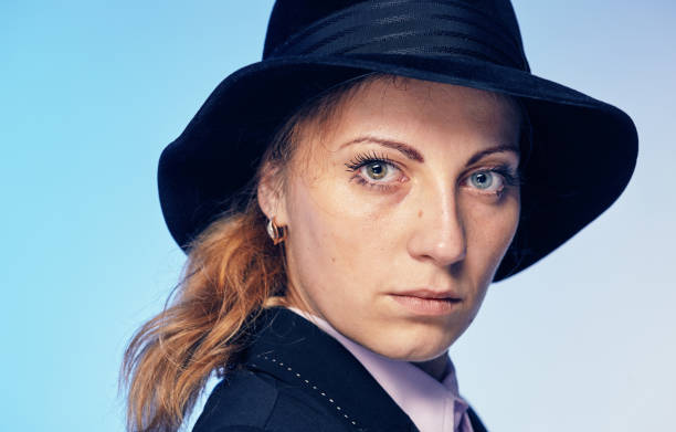 istock young attractive woman in a hat 957514256