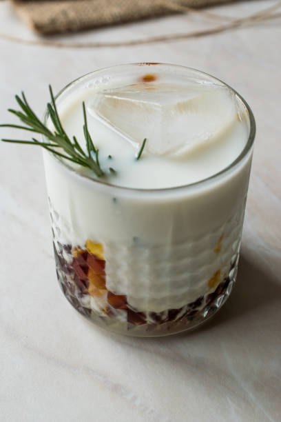 istock Salted Caramel White Russian Cocktail with Rosemary and Ice. 957515712