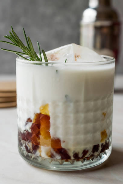 istock Salted Caramel White Russian Cocktail with Rosemary and Ice. 957516320