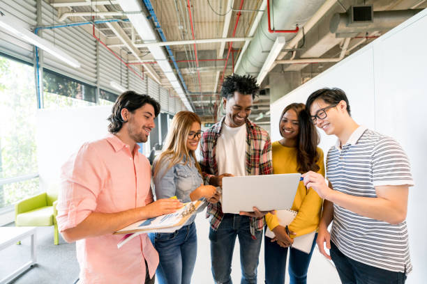 istock Group of people working online at a creative office 957516468