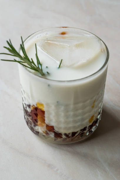 istock Salted Caramel White Russian Cocktail with Rosemary and Ice. 957520716