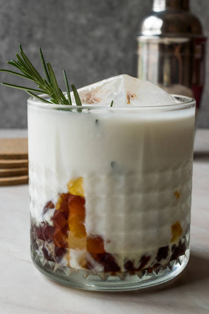 istock Salted Caramel White Russian Cocktail with Rosemary and Ice. 957521170