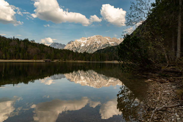 istock View to the Kampenwand on Ferchensee with some great reflections 957521632