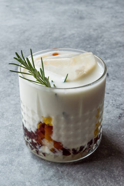 istock Salted Caramel White Russian Cocktail with Rosemary and Ice. 957528370