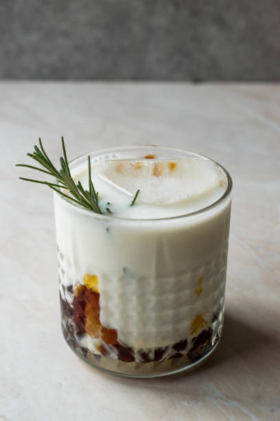 istock Salted Caramel White Russian Cocktail with Rosemary and Ice. 957530506