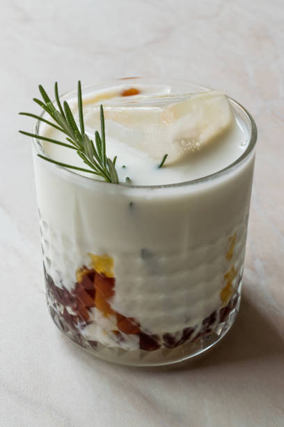 istock Salted Caramel White Russian Cocktail with Rosemary and Ice. 957531196