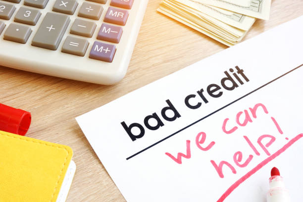 A paper that says bad credit, we can help at the top of the table
