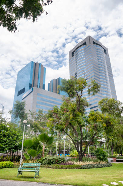 istock Modern Skyscrapers Viewed From Chatuchak Park In Bangkok, Thailand 957540260