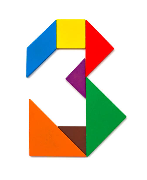istock wooden tangram shaped like a number 3 on white 957540332