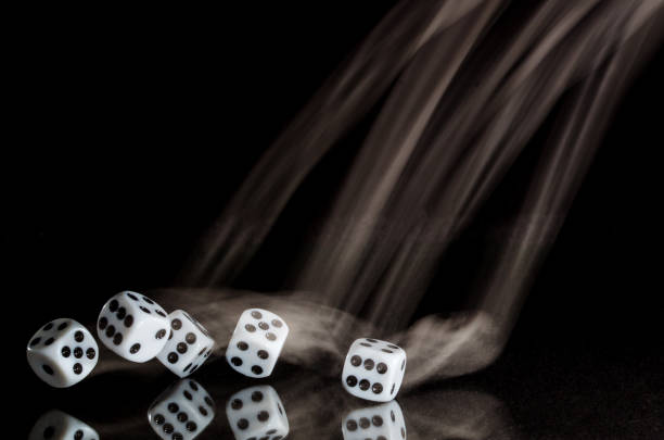 istock Risking All on a Roll of the Dice 957549982