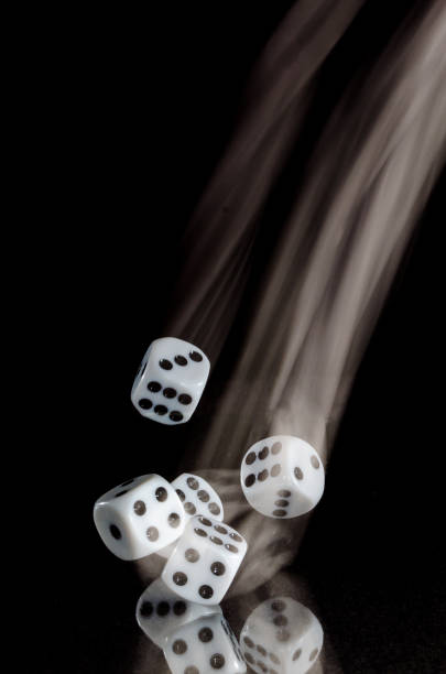 istock Risking All on a Roll of the Dice 957550004
