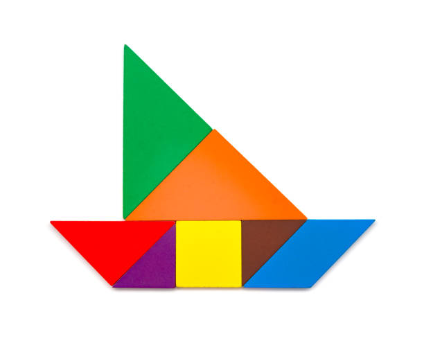wooden tangram shaped like a sailboat on white background