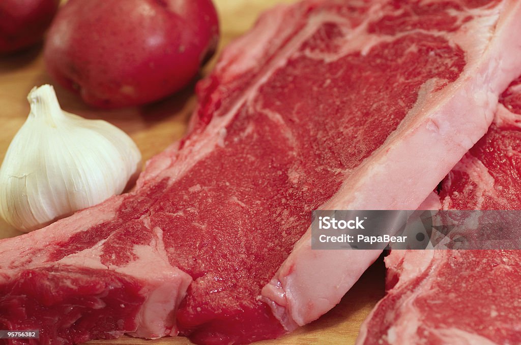 Bistec, las papas con ajo - Foto de stock de Ajo libre de derechos