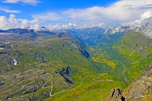Panoramic view from top of Dalsnibba on Nibbevegen road leading down to Geiranger Fjord, Norway, Europe