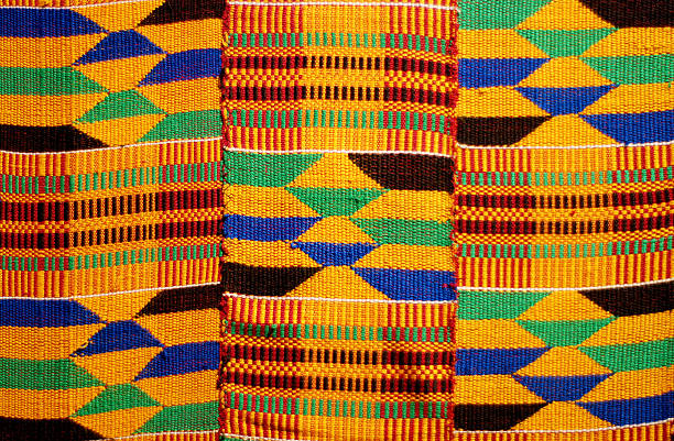 African colored pattern fabric background African colored pattern fabric background west africa stock pictures, royalty-free photos & images