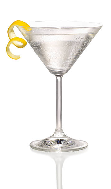martini con un tocco di limone - martini glass foto e immagini stock