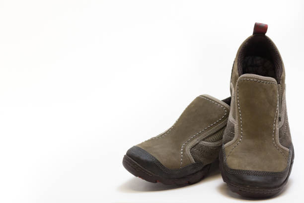 Stylish brown leather boots for men isolated on white background