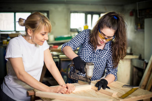 istock Family Working Together in Workshop 957580474